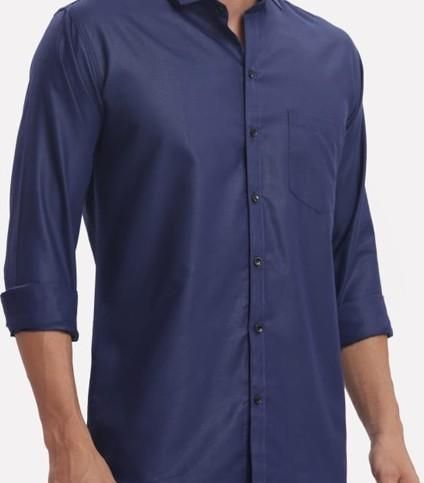 Navy blue button-up shirt with rolled-up sleeves on a white background