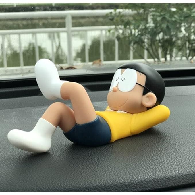 Cartoon character figurine relaxing on a car dashboard