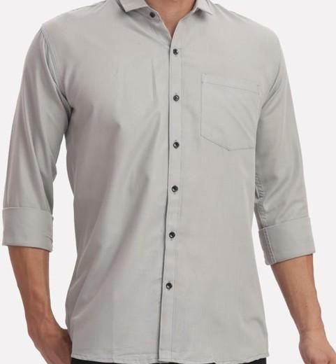 Light gray button-up shirt worn by a person on a white background