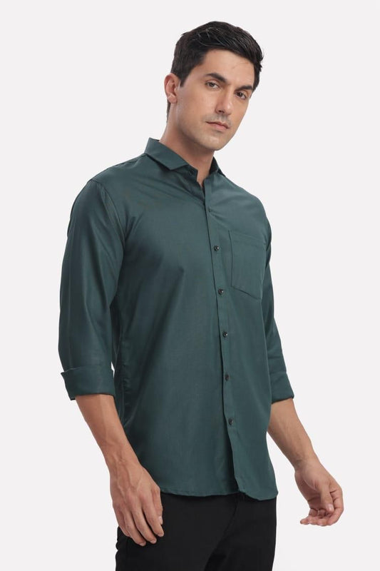 Man wearing a green shirt on a white background