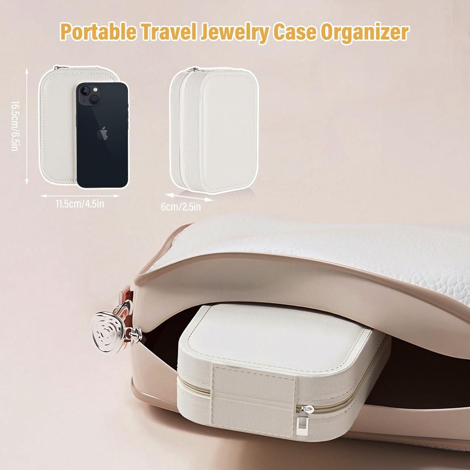 Portable travel jewelry case organizer with dimensions indicated on a light pink background