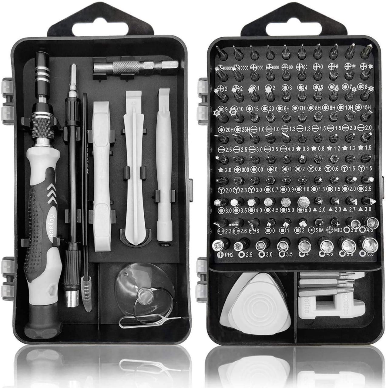 Set of screwdrivers and tools in a black case on a white background