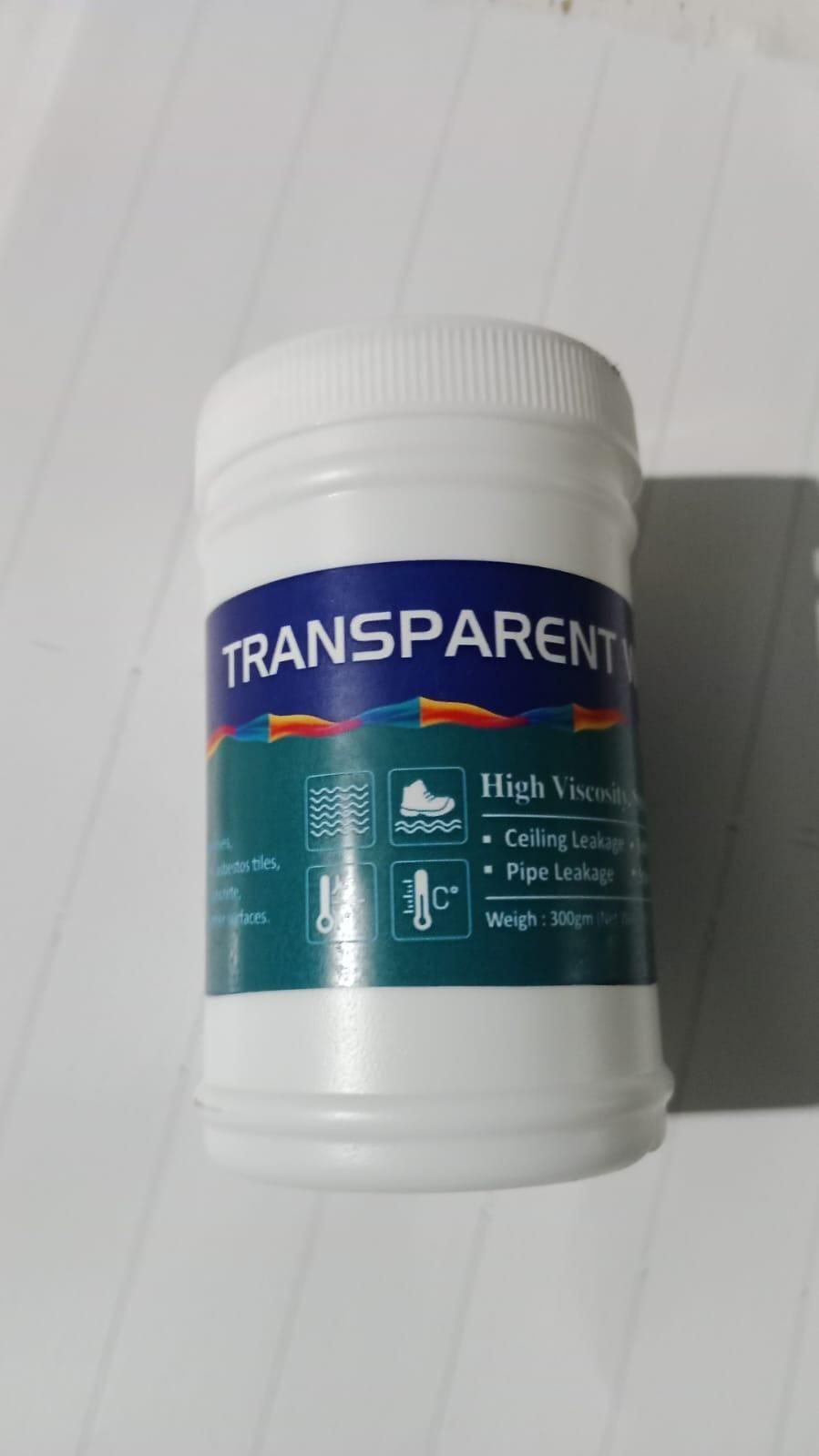 Transparent vinyl roll with a white container on a white background